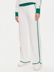 Guess Spodnie dresowe V4GB02 KBFB2 Zielony Regular Fit. Zielone spodnie sportowe Guess, xs, z aplikacjami, z dresówki. Za 419.99 zł.