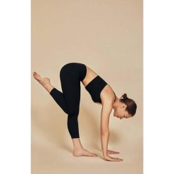 Legginsy do jogi Moonholi Yoggings 7/8. Czarne legginsy MOONHOLI, bez wzorów, na jogę i pilates. Za 229.99 zł.