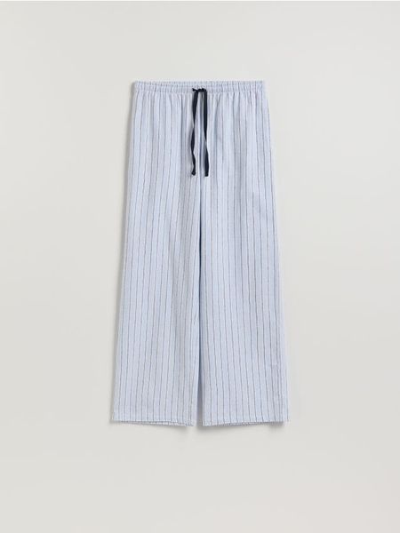 Spodnie od piżamy - jasnoniebieski. Niebieskie piżamy Reserved, bez wzorów, z bawełny, bez ramiączek. Za 79.99 zł.