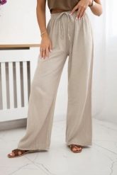 Spodnie muślinowe z szeroką nogawką beżowe. Brązowe spodnie materiałowe KESI, do pracy, l, bez wzorów, z bawełny, plus size. Za 150.52 zł.