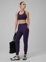 4F Spodnie treningowe szybkoschnące damskie - fioletowe L. Fioletowe spodnie dresowe 4f, l, bez wzorów. Za 179.99 zł.