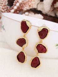 Pierres de Jade Pozłacane kolczyki-wkrętki z agatami rozmiar: onesize. Czerwone kolczyki Pierres de Jade, z agatem, pozłacane. Za 60.99 zł.