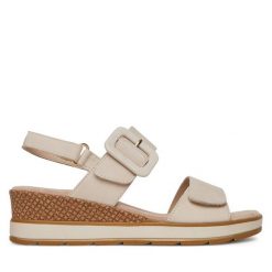 Sandały Caprice. Białe sandały Caprice, bez wzorów, bez obcasa, na koturnie, bez zapięcia. Za 229.99 zł.