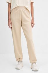 GUESS Beżowe damskie spodnie dresowe Primula. Brązowe spodnie dresowe Guess, s, z aplikacjami, z dresówki. W wyprzedaży za 239.99 zł.