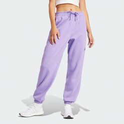 Spodnie Essentials 3-Stripes French Terry Cuffed. Białe obuwie sportowe Adidas, z materiału, bez zapięcia, na fitness i siłownię. Za 219.00 zł.