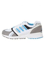 Adidas Sneakersy w kolorze biało-szaro-błękitnym rozmiar: 42. Białe trampki Adidas, bez wzorów, bez zapięcia. Za 281.10 zł.