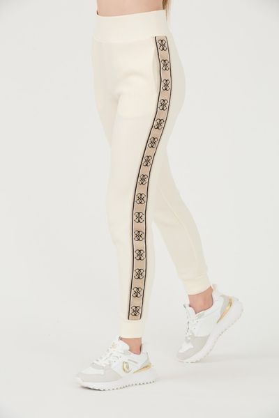 GUESS Beżowe damskie spodnie dresowe Britney Jogger, Rozmiar XL. Brązowe spodnie dresowe Guess, xl, z aplikacjami, z dresówki. W wyprzedaży za 226.99 zł.