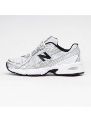 New Balance Sneakersy "740" w kolorze srebrno-biało-czarnym rozmiar: 38. Białe trampki New Balance, bez wzorów, bez zapięcia. Za 467.95 zł.