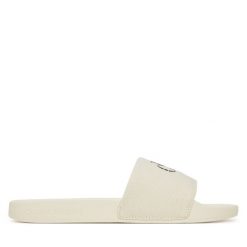 Klapki Calvin Klein Jeans. Brązowe klapki Calvin Klein Jeans, bez wzorów, z jeansu, bez obcasa. Za 129.99 zł.