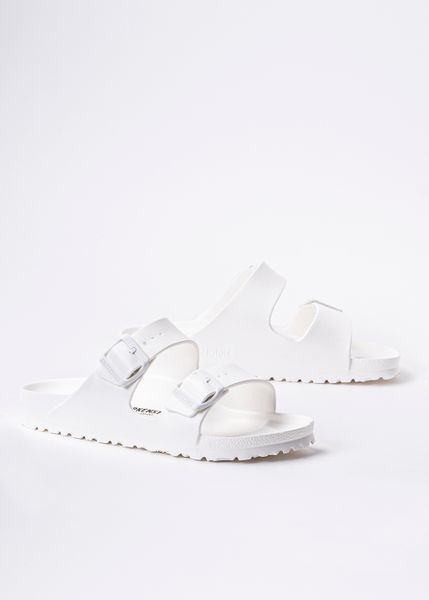 Birkenstock Arizona Essentials Klapki damskie białe. Białe klapki Birkenstock, bez wzorów, bez obcasa. Za 199.99 zł.