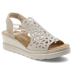 Sandały damskie Rieker, cholewka ze skóry ekologicznej ażurowa konstrukcja ozdobne zdobienia z drobnymi kryształkami, beżowe, 67465-62. Brązowe sandały Rieker, z aplikacjami, ze skóry ekologicznej, bez obcasa, na koturnie, bez zapięcia. Za 319.00 zł.