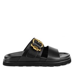 Klapki Gino Rossi. Czarne klapki Gino Rossi, bez wzorów, bez obcasa. Za 329.99 zł.