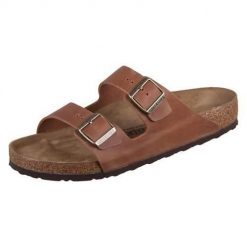 Klapki unisex Birkenstock Arizona Cognac. Brązowe klapki Birkenstock, bez wzorów, z materiału, bez obcasa. Za 723.00 zł.