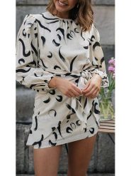 Milan Kiss Sukienka w kolorze kremowo-czarnym rozmiar: S. Brązowe sukienki Milan Kiss, na imprezę, s, bez wzorów, z wiskozy, bez kołnierzyka, bez ramiączek, mini. Za 165.99 zł.