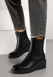 Czarne Botki Sztyblety na Koturnie Fesirea. Czarne botki Born2be, bez wzorów, z jeansu, bez obcasa, na koturnie, bez zapięcia. Za 139.99 zł.