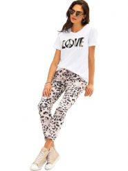 Heine Koszulka w kolorze białym rozmiar: 42. Białe bluzki Heine, bez wzorów, z bawełny, bez kołnierzyka, bez ramiączek. Za 43.99 zł.