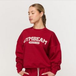 Bluza damska fitness bez kaptura czerwona Varsity. Czerwone bluzy GYMBEAM, m, bez wzorów, z bawełny, bez kaptura. Za 139.90 zł.