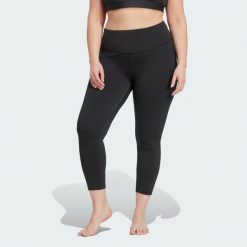 Legginsy All Me 7/8 (Plus Size). Czarne legginsy Adidas, plus size, bez wzorów, z materiału. Za 279.00 zł.