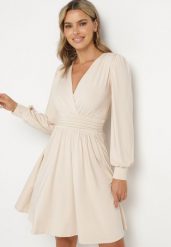 Beżowa Rozkloszowana Sukienka z Wiskozą Selithiel. Brązowe sukienki Born2be, na co dzień, l, bez wzorów, z wiskozy, eleganckie, bez kołnierzyka, bez ramiączek, mini, kopertowe. Za 169.99 zł.