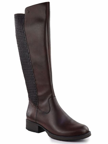 Skórzane brązowe kozaki z elastyczną gumą ocieplane Rieker Z9591-27. Brązowe kozaki Rieker, z gumy, bez obcasa, bez zapięcia. Za 529.00 zł.