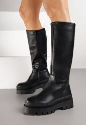 Czarne Kozaki na Platformie w Stylu Grunge Zarindra. Czarne kozaki Born2be, z jeansu, bez obcasa, na platformie, bez zapięcia. Za 179.99 zł.