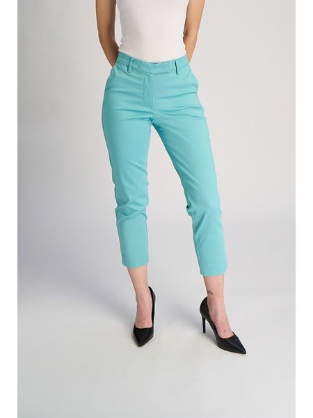 Marks & Spencer Spodnie chino w kolorze turkusowym rozmiar: 44. Niebieskie spodnie materiałowe Marks & Spencer, bez wzorów, z podwyższonym stanem. Za 51.95 zł.