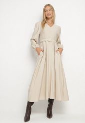 Beżowa Wiskozowa Sukienka o Rozkloszowanym Kroju z Paskiem z Klamerką Arilesse. Brązowe sukienki Born2be, na co dzień, l, bez wzorów, z materiału, eleganckie, bez kołnierzyka, bez ramiączek, maxi, rozkloszowane. Za 159.99 zł.