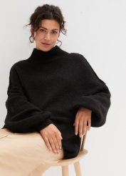 Sweter z dzianiny o luźnym splocie. Czarne swetry bonprix, bez wzorów, z dzianiny, bez ramiączek. Za 124.99 zł.