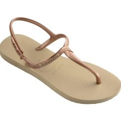 Klapki Havaianas Model 4144756 Kolor Brąz. Brązowe klapki Havaianas, bez wzorów, z gumy, bez obcasa. Za 69.99 zł.