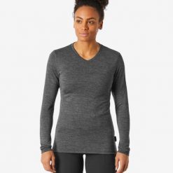 Koszulka trekkingowa damska Simond Travel 500 merino. Czarne bluzki SIMOND, l, bez wzorów, z jersey, sportowe, bez kołnierzyka, bez ramiączek. Za 129.99 zł.