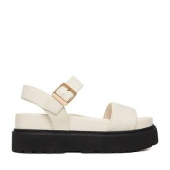 Sandały JENNY. Białe sandały Jenny, bez wzorów, bez obcasa, na płaskiej podeszwie, bez zapięcia. Za 159.99 zł.