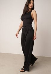 Czarne Szerokie Spodnie z Teksturalnej Tkaniny z Ozdobnym Guzikiem Liphia. Czarne spodnie materiałowe Born2be, do pracy, l, bez wzorów, z jeansu, z podwyższonym stanem, długie. Za 49.99 zł.