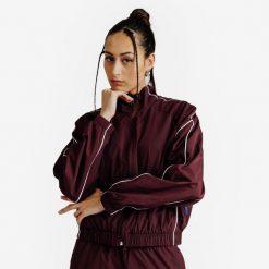 Bluza dresowa damska Heritage. Fioletowe bluzy DECATHLON, s, bez wzorów, z dresówki, bez kaptura. Za 129.99 zł.