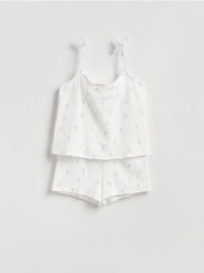 Muślinowa piżama dwuczęściowa - złamana biel. Piżamy Reserved, bez wzorów, z bawełny, bez ramiączek. Za 99.99 zł.