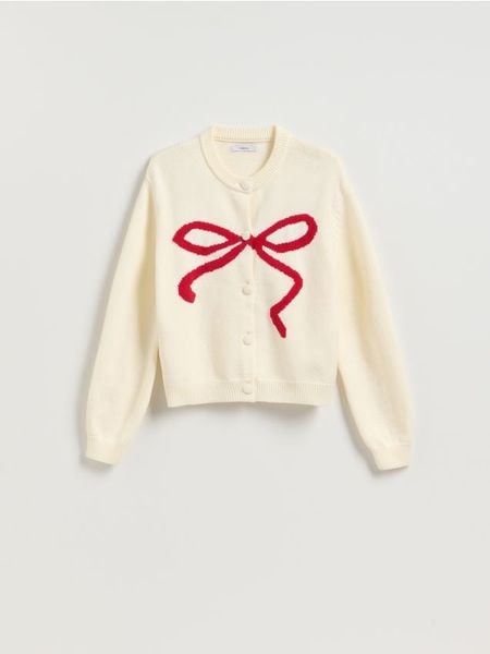 Kardigan z kokardką - kremowy. Białe kardigany Reserved, l, bez wzorów, z dzianiny. W wyprzedaży za 59.99 zł.