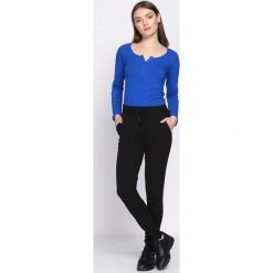 Czarne Spodnie Dresowe Occasion. Spodnie dresowe marki Born2be. Za 49.99 zł.
