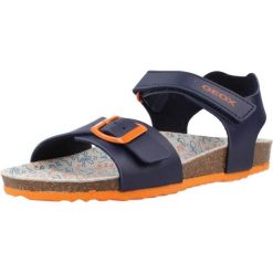 Sandały Geox Model J Ghita B. Niebieskie sandały Geox, bez wzorów, z syntetyku, bez obcasa, bez zapięcia. Za 142.99 zł.
