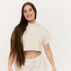 Bluza damska fitness z kapturem krótka Relay Cropped Pearl. Białe bluzy GYMBEAM, xl, bez wzorów, z bawełny, z kapturem. Za 128.90 zł.