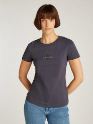 CALVIN KLEIN JEANS Koszulka w kolorze czarnym rozmiar: XS. Czarne bluzki Calvin Klein Jeans, xs, bez wzorów, z bawełny, bez kołnierzyka, bez ramiączek. Za 97.28 zł.