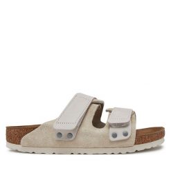 Klapki Birkenstock. Brązowe klapki Birkenstock, bez wzorów, bez obcasa. Za 459.99 zł.