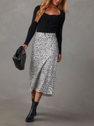 LA Angels Koszulka w kolorze czarnym rozmiar: M. Czarne bluzki LA Angels, m, bez wzorów, prążkowane, bez kołnierzyka, bez ramiączek. Za 113.99 zł.