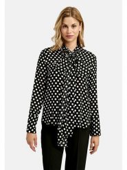 Milano Italy Bluzka w kolorze czarnym rozmiar: 34. Czarne bluzki Milano Italy, bez wzorów, z wiskozy, bez kołnierzyka, bez ramiączek. Za 173.99 zł.