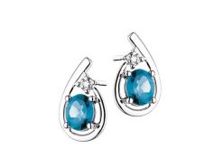 Kolczyki z białego złota z diamentami i topazami London Blue - próba 375. Białe kolczyki Apart, z diamentem, złote. W wyprzedaży za 629.30 zł.