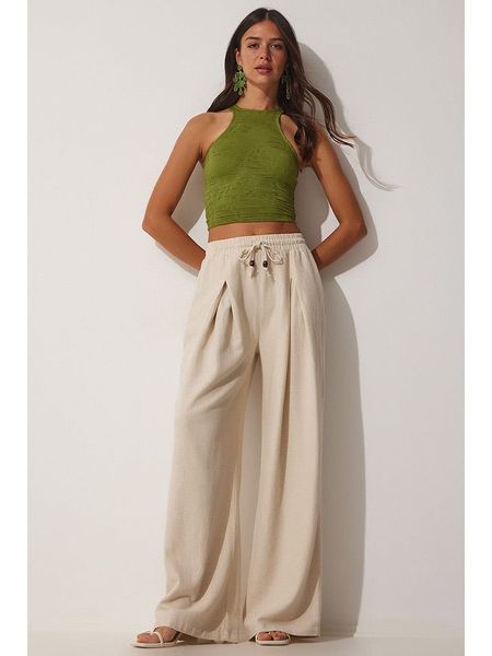 Hapiness Istanbul Spodnie w kolorze beżowym rozmiar: 36. Brązowe spodnie materiałowe Hapiness Istanbul, bez wzorów, z bawełny, z podwyższonym stanem. Za 87.81 zł.