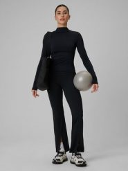 4F Spodnie treningowe z rozszerzanymi nogawkami damskie - czarne L. Czarne spodnie dresowe 4f, l, bez wzorów, ze skóry, z podwyższonym stanem, na fitness i siłownię. Za 169.99 zł.