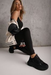 Czarne Legginsy Basic z Modelującą Wstawką w Pasie Liacan. Czarne legginsy Renee, l, bez wzorów, z jeansu, krótkie. Za 49.99 zł.