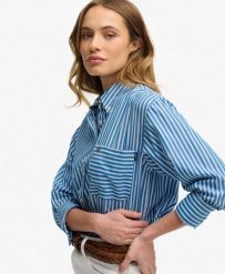 Superdry Koszula Poplin Relaxed damska z długim rękawem z bawełny organicznej. Niebieskie koszule Superdry, bez wzorów, z bawełny, klasyczne, bez kołnierzyka, bez ramiączek. Za 279.65 zł.