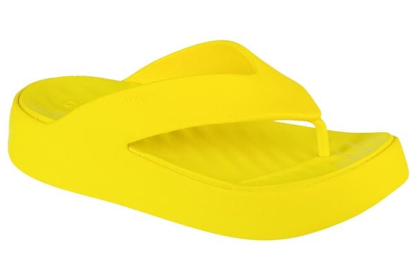 Japonki damskie Crocs C4618. Żółte klapki Crocs, bez wzorów, z materiału, bez obcasa. Za 139.99 zł.