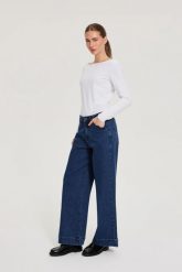 Jeansy z szerokimi nogawkami niebieskie. Niebieskie jeansy MOODO, l, bez wzorów. Za 149.99 zł.