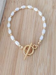 Nakkash Pozłacana bransoletka z kamieniami szlachetnymi rozmiar: onesize. Białe bransoletki Nakkash, z perłą, pozłacane. Za 30.99 zł.